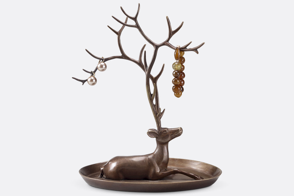jewelry tray with resting deer and antlers designed to hold rings and necklaces