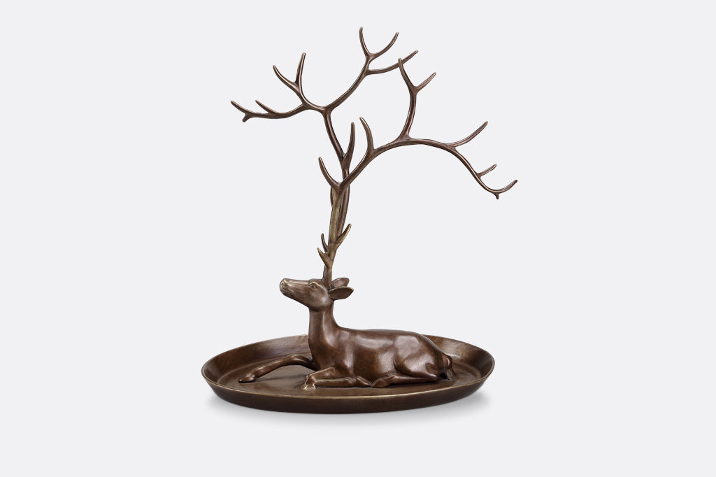jewelry tray with resting deer and antlers designed to hold rings and necklaces