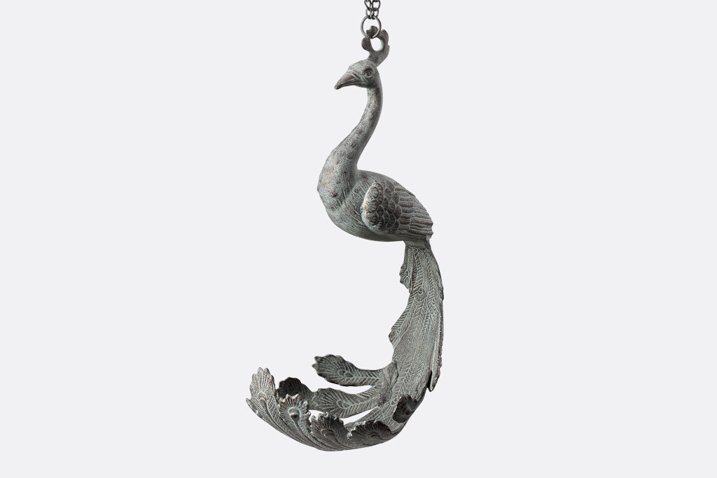 hanging sculptural planter with peacock shape