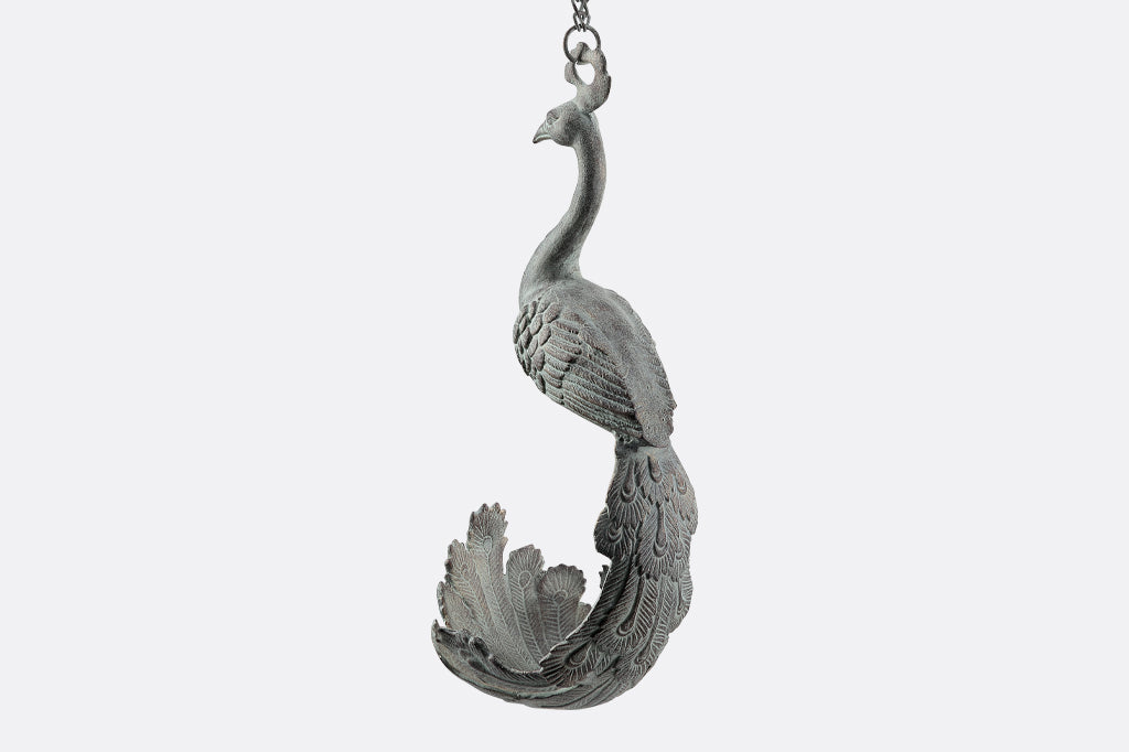 hanging sculptural planter with peacock shape