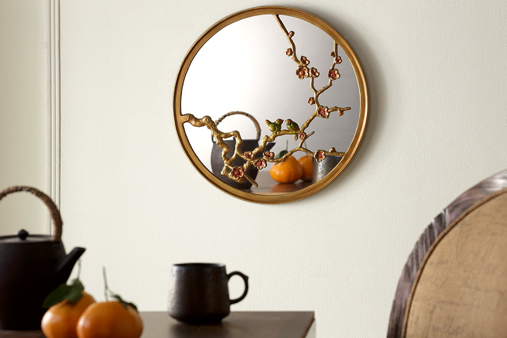 cast metal gold mirror with blossom branches and pink blooms and two small birds on branch