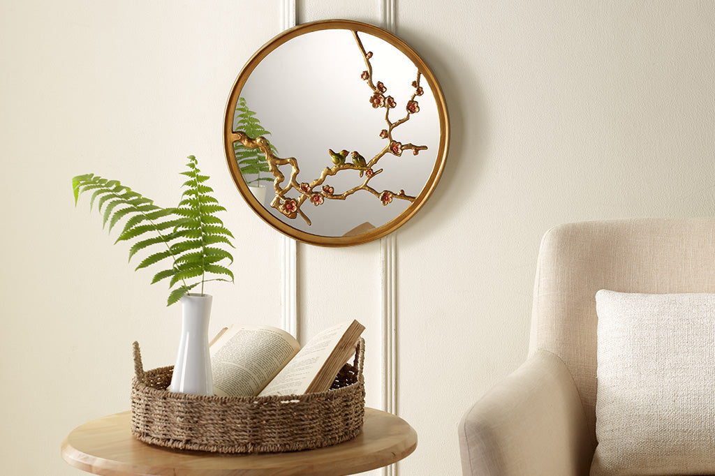 cast metal gold mirror with blossom branches and pink blooms and two small birds on branch
