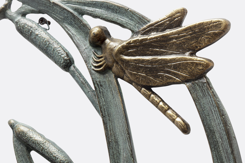 birdfeeder station that hangs on walls with dragonfly and cattail motif