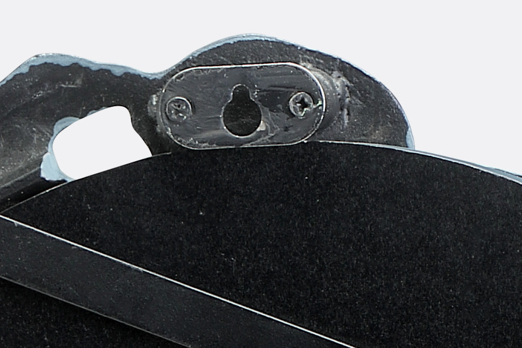 detailed view of mounting hardware. Hang with one screw