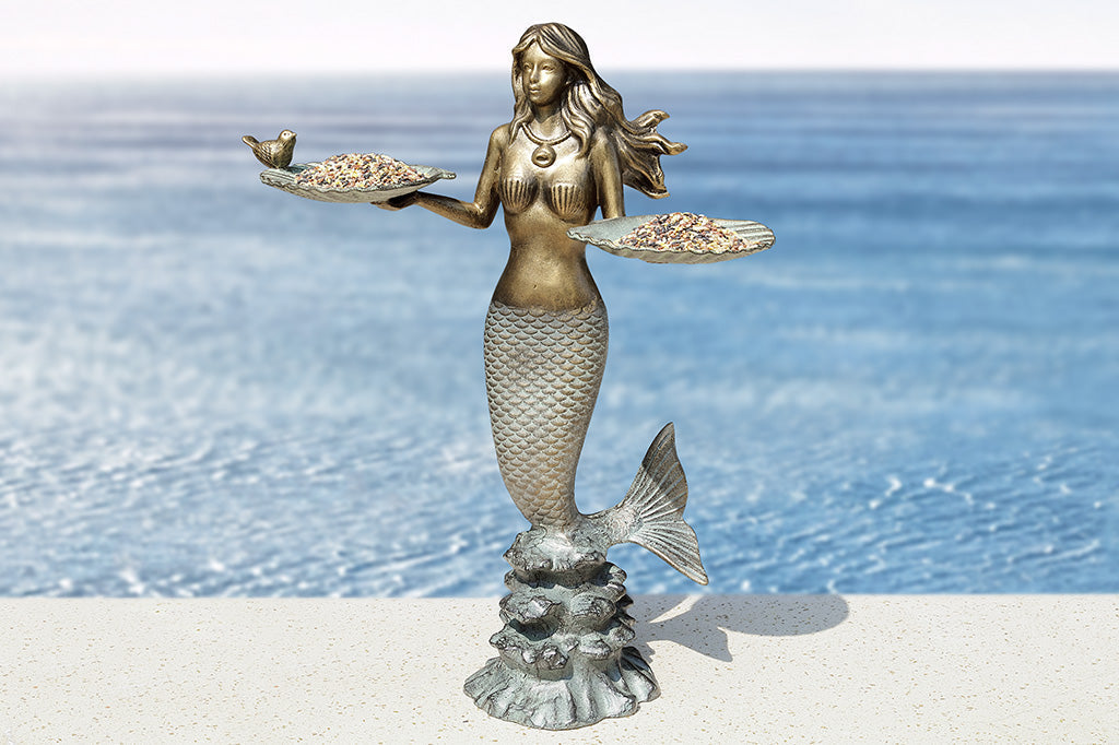 mermaid holding two shells with little bird on edge cast metal birdfeeder