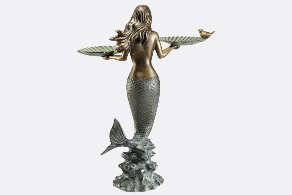 mermaid holding two shells with little bird on edge cast metal birdfeeder