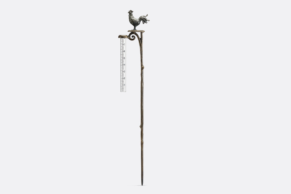 Rooster finial on staked rain catcher