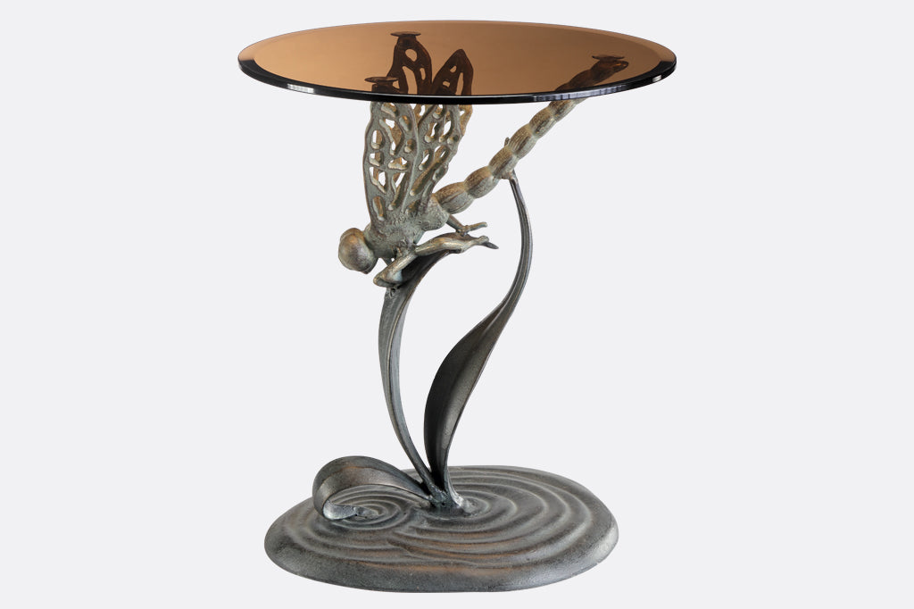 cast metal dragonfly accent table with glass top