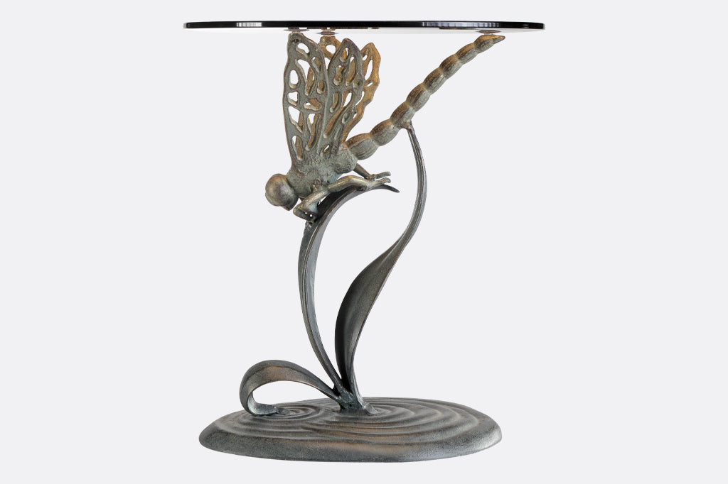 cast metal dragonfly accent table with glass top