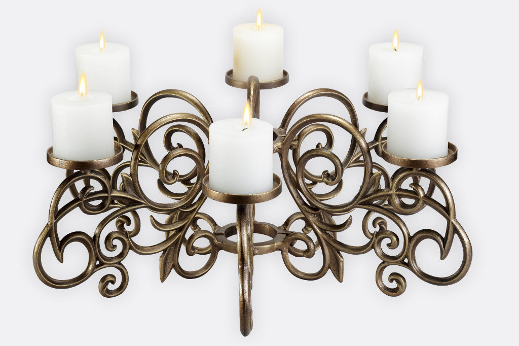scrollwork candelabra designed to fit around patio table umbrella pole