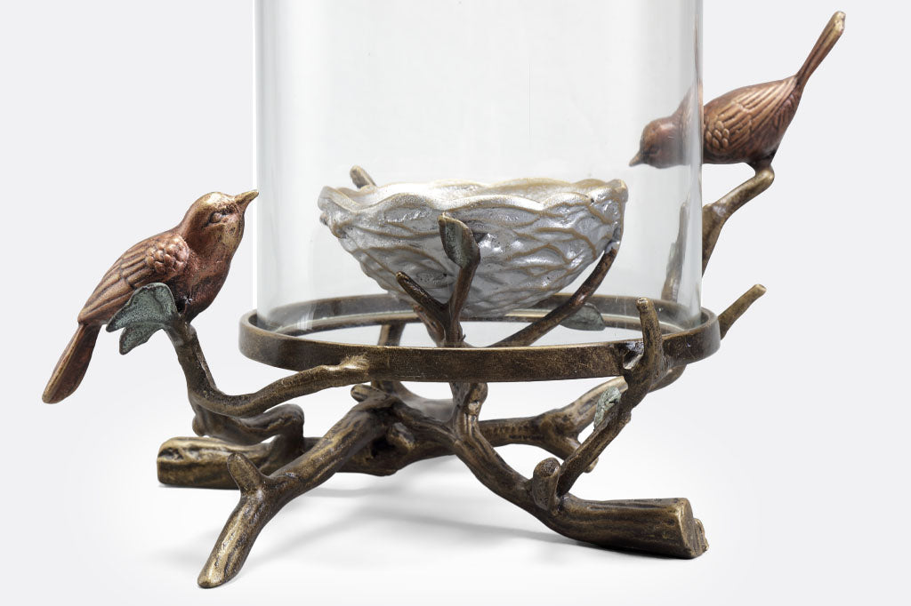 Close up view of the Tri-Finish bird and nest candleholder 