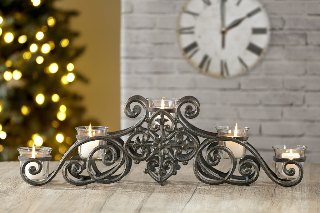 scrollwork candelabra shown on table in home decorated for Christmas
#color_zinc