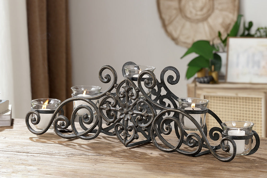 scrollwork candelabra that holds 5 votive candles in glass cups
#color_zinc