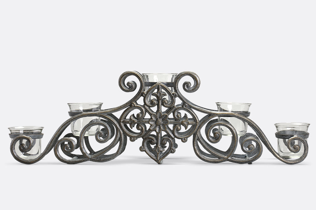 scrollwork candelabra that holds 5 votive candles in glass cups
#color_zinc