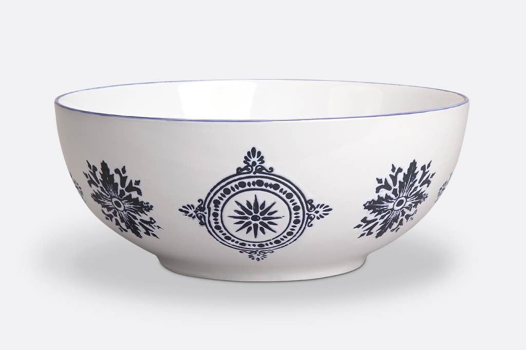 white ceramic bowl with blue mediterranean glazed print