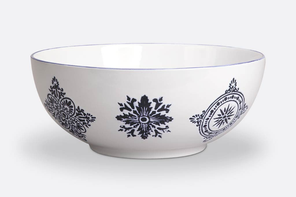 white ceramic bowl with blue mediterranean glazed print