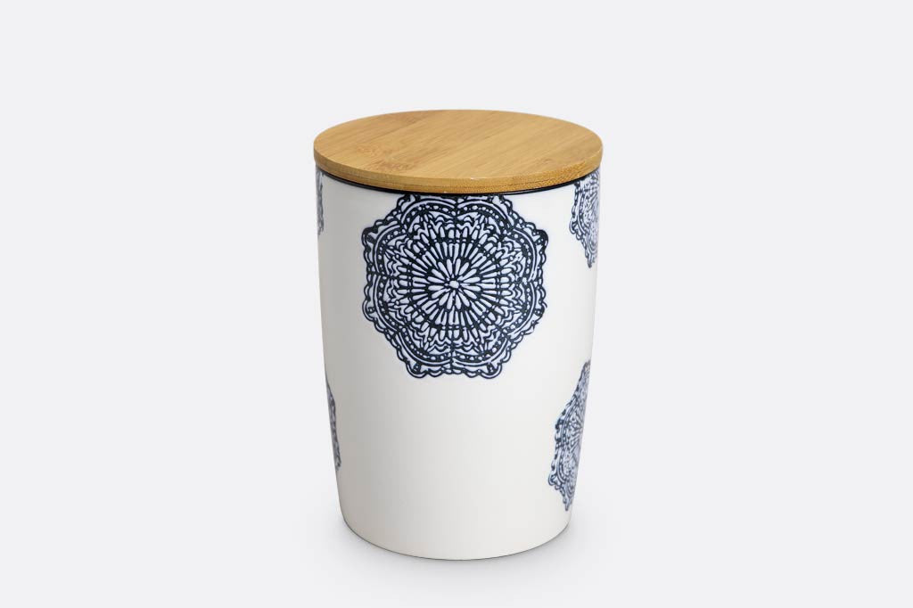 white ceramic canister with wood lid; blue mediterranean glazed print and blue rim