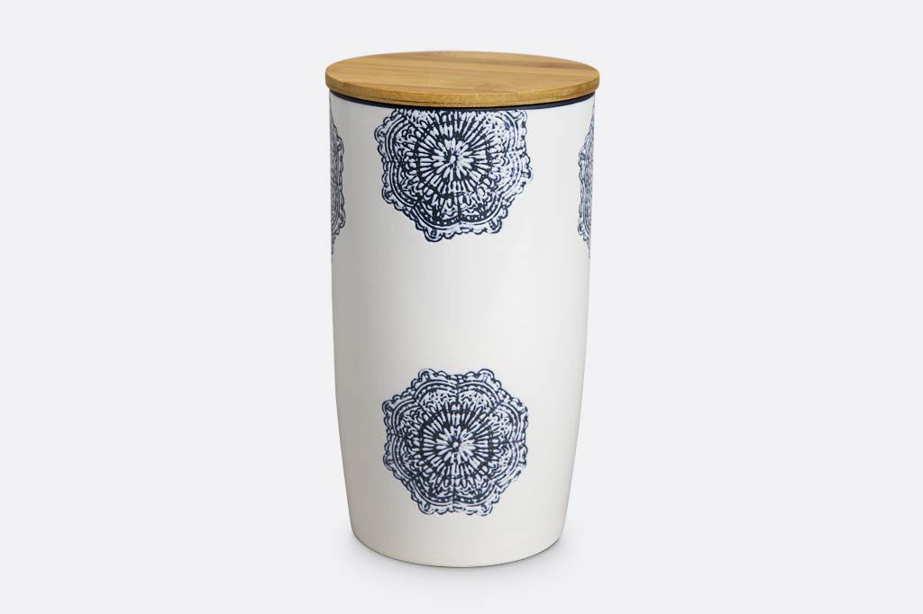 white ceramic canister with wood lid; blue mediterranean glazed print and blue rim