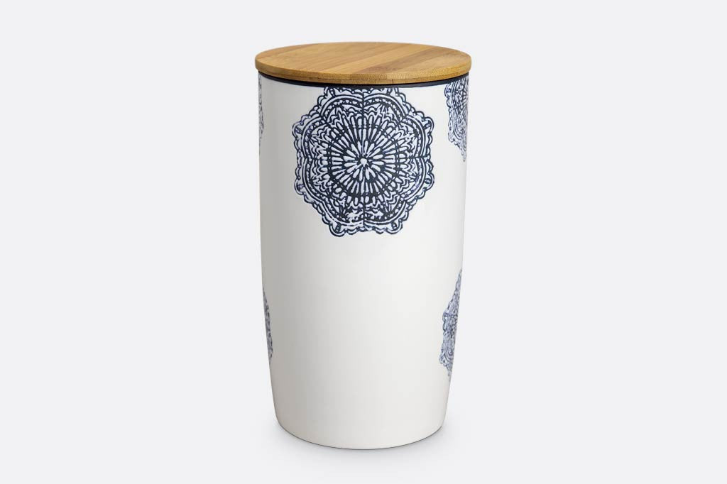white ceramic canister with wood lid; blue mediterranean glazed print and blue rim
