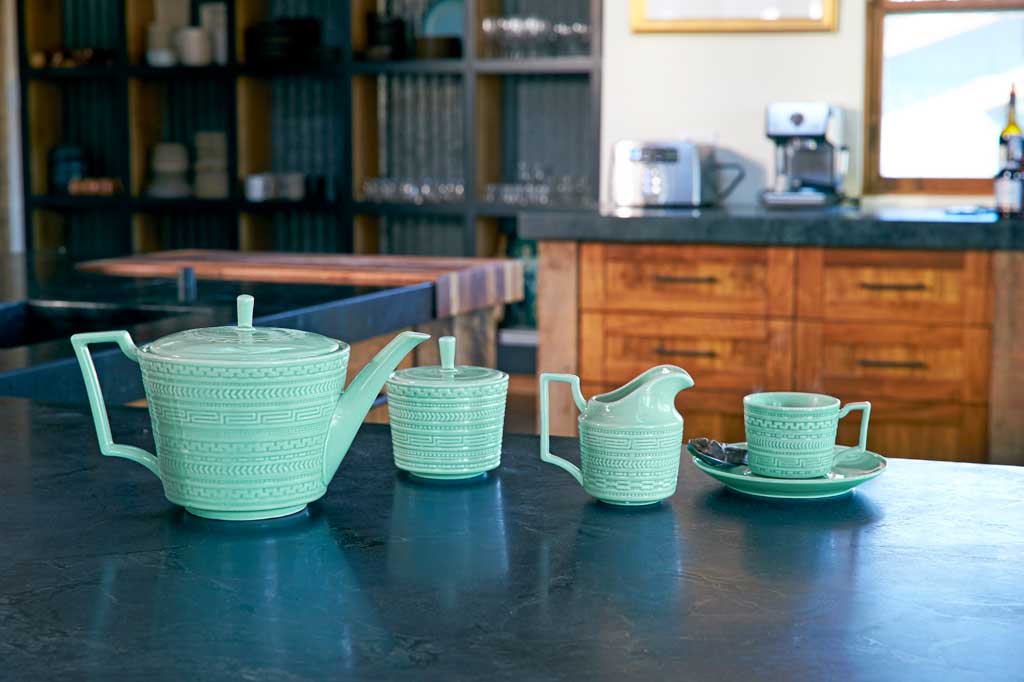 ceramic asian themed cream and sugar set shown on kitchen counter