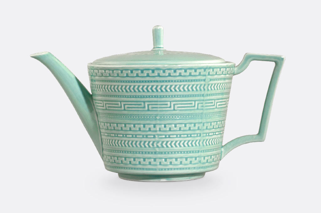 light mint green ceramic asian themed tea pot; small
