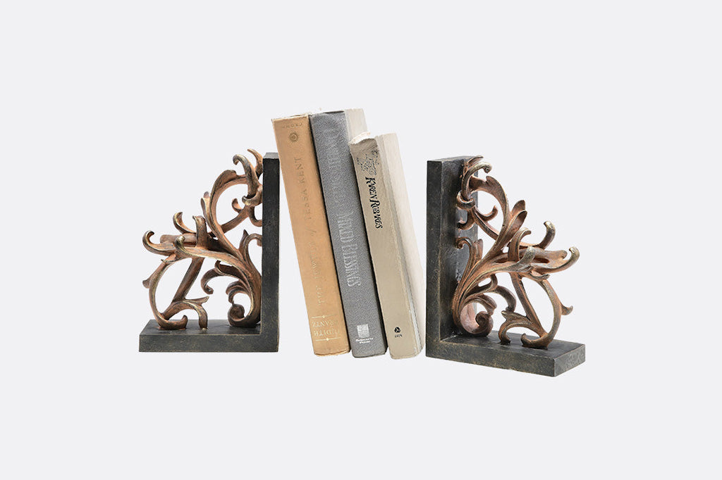 elaborate scrollwork bookend pair