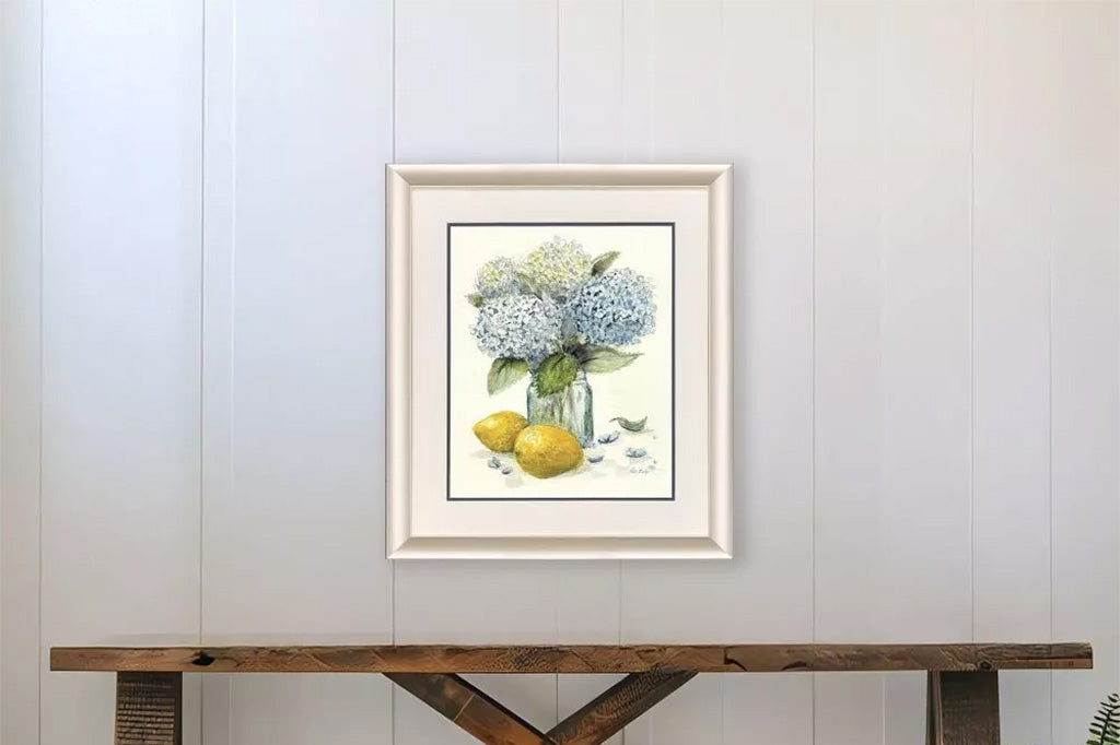 Framed artwork of hydrangeas and lemons