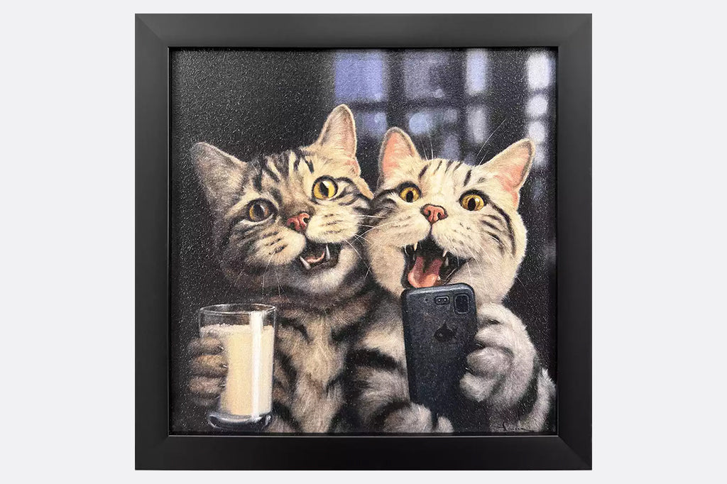 A framed artwork of two cats at a happy hour drinking milk and taking a selfie.