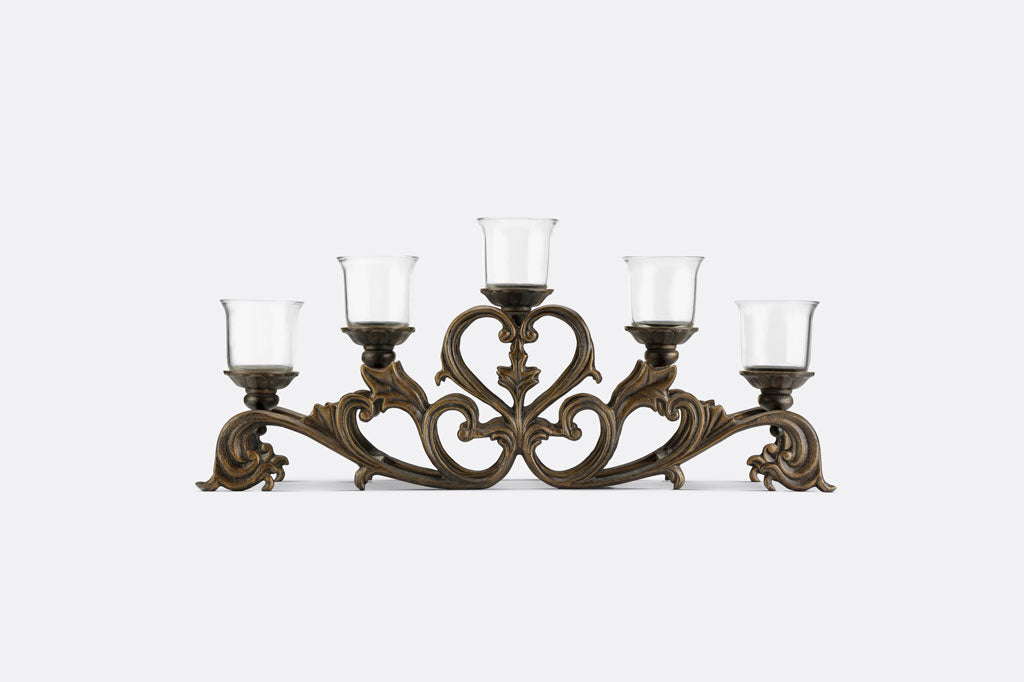 Decorative candle holder with five glass candle holders on a white background