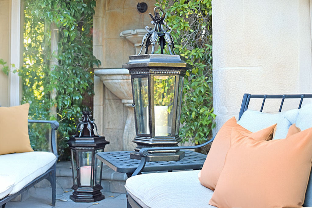 PB34333 Acanthus Garden Lantern with candle shown in Italianate garden setting