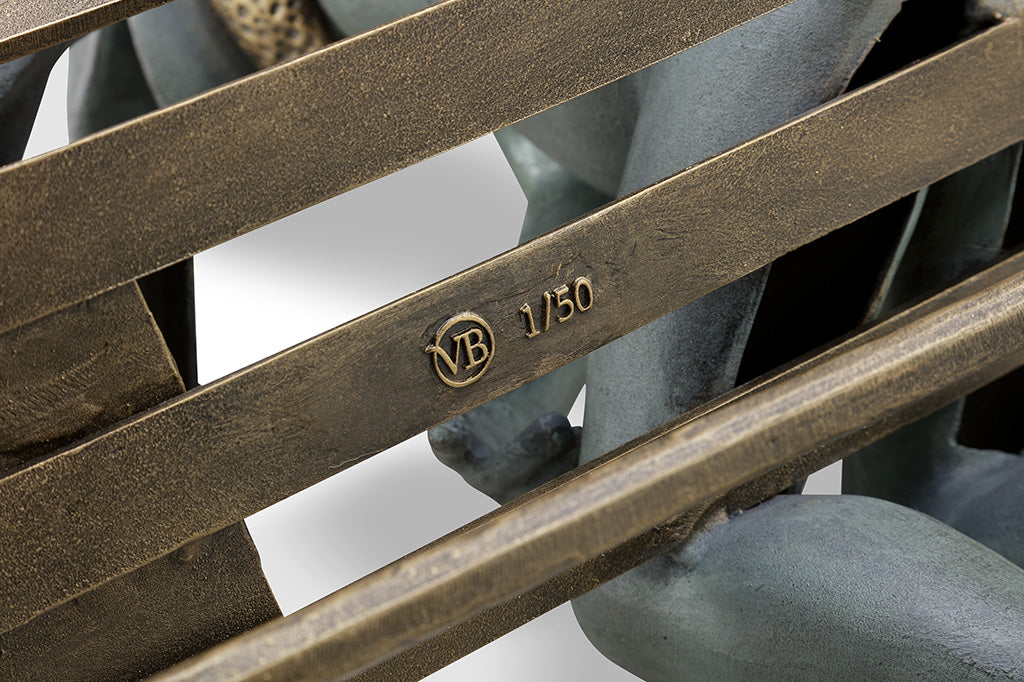 Frog and squirrel statue gifting an acorn on a bench