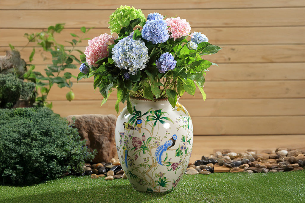 Decorative vase with floral and bird patterns