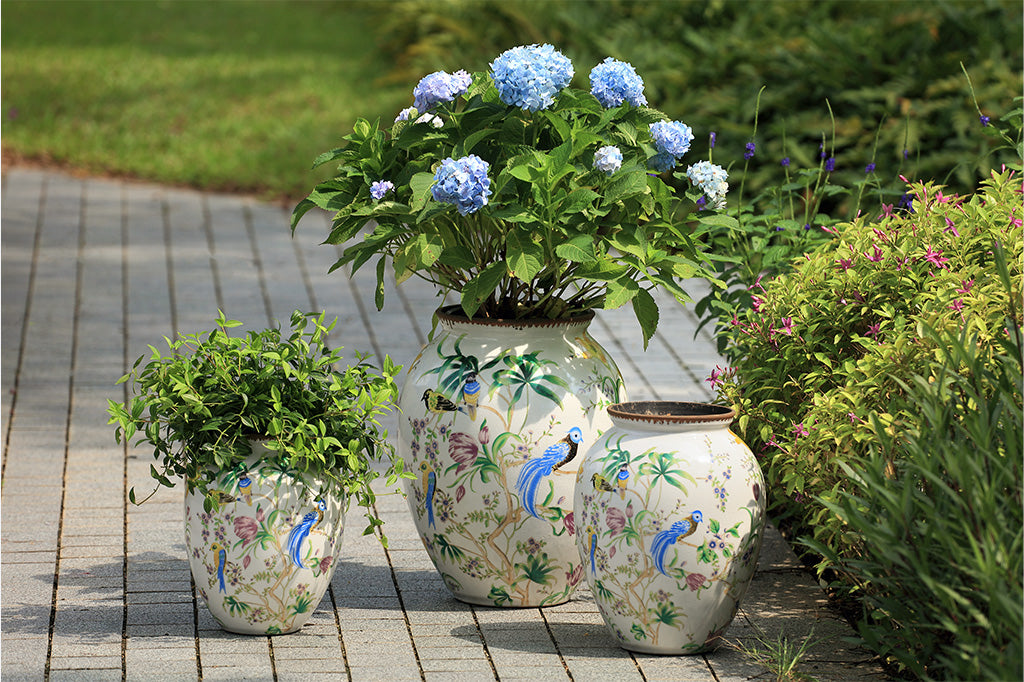 Decorative vase with floral and bird patterns