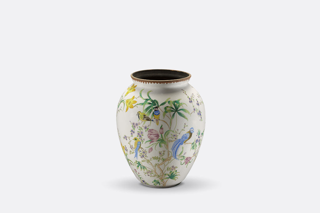 Decorative vase with floral and bird patterns on a white background