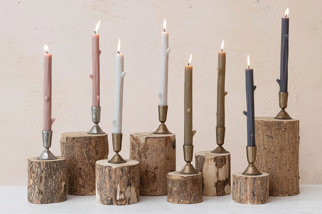 mauve blush taupe twig taper candles staged with white, brown, and blue colorways