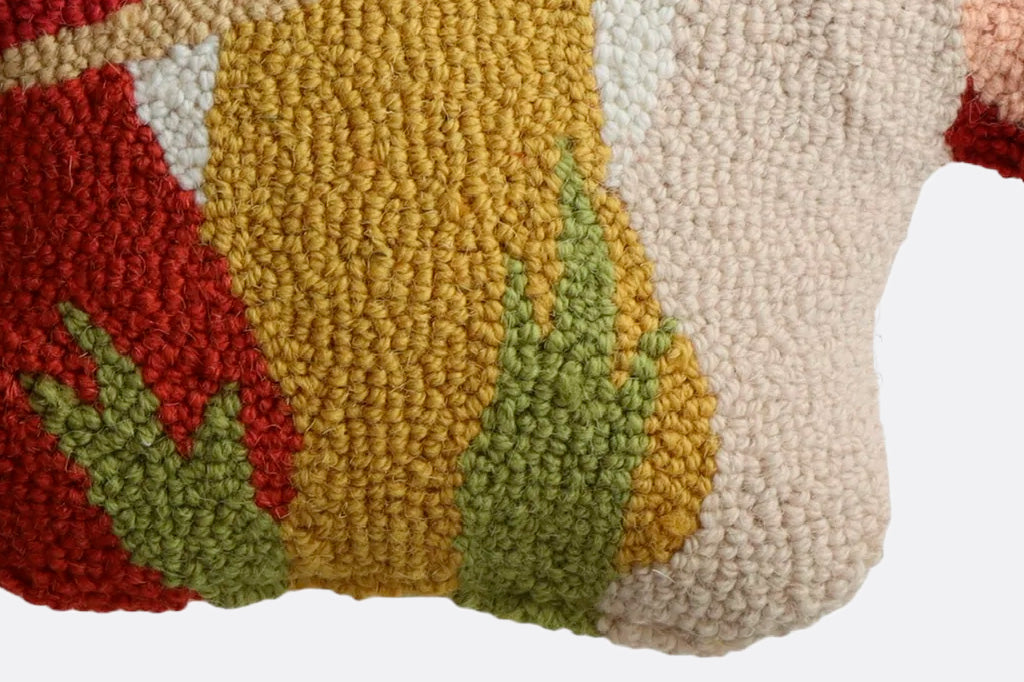 close up view of the wool hooked pillow