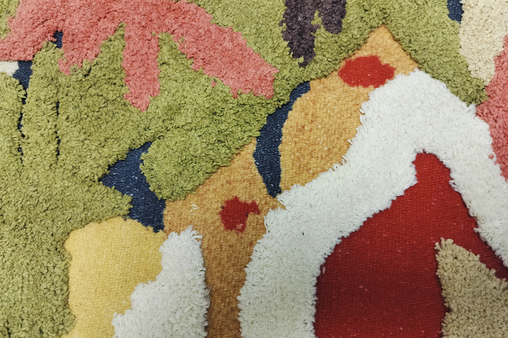 detailed view of different pile heights of rug. Some layers are piled higher to create three dimensional texture