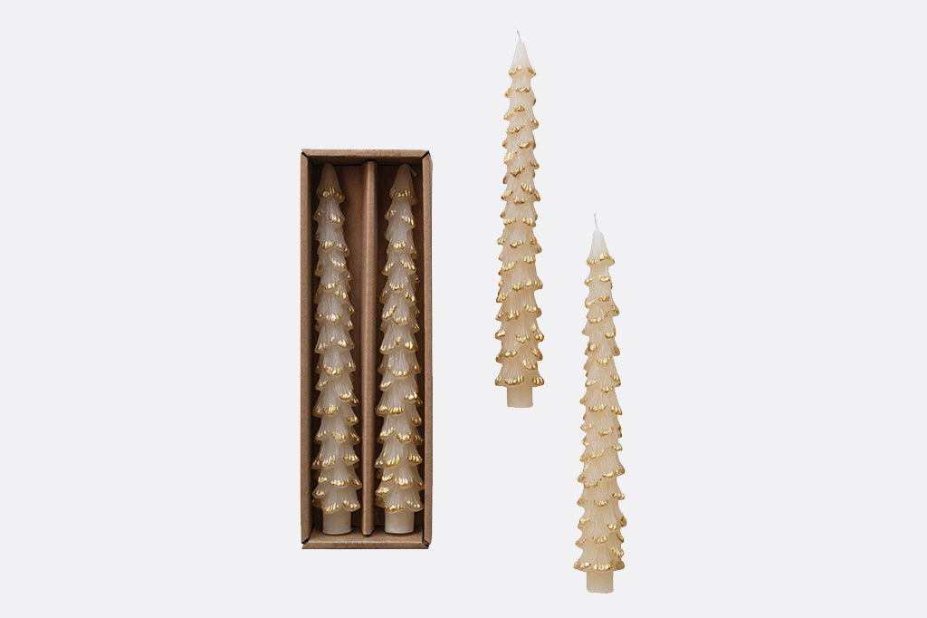 tree shaped taper candles in cream color with gold trimming on edges