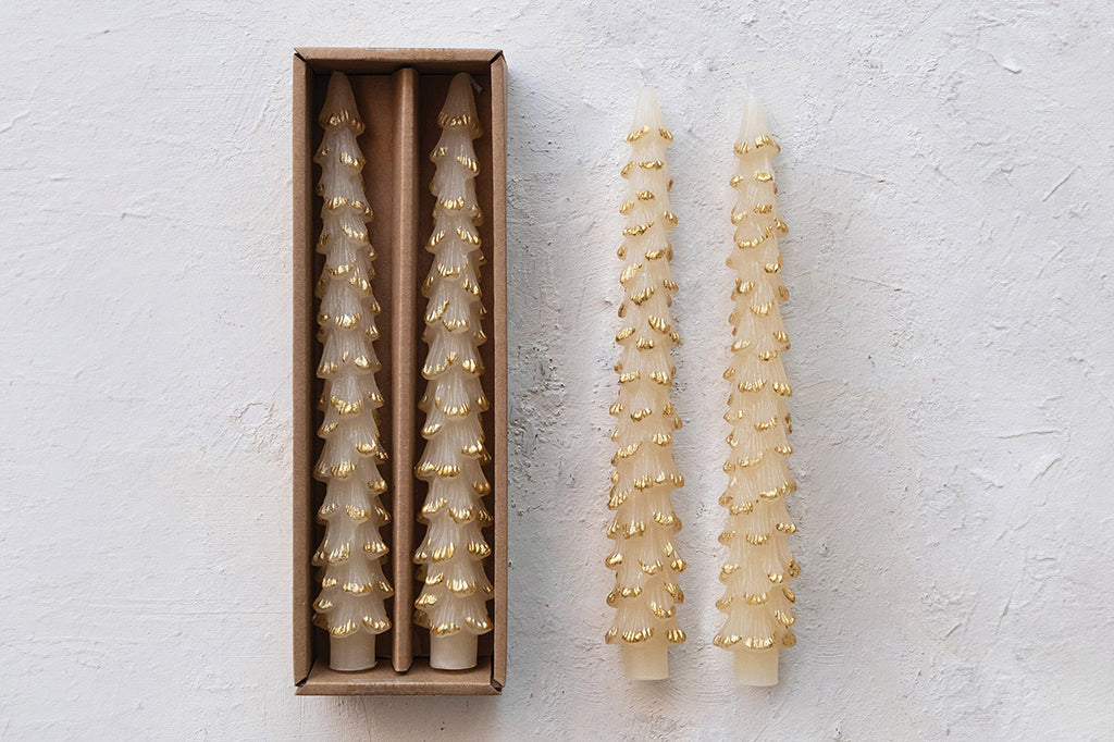 tree shaped taper candles in cream color with gold trimming on edges