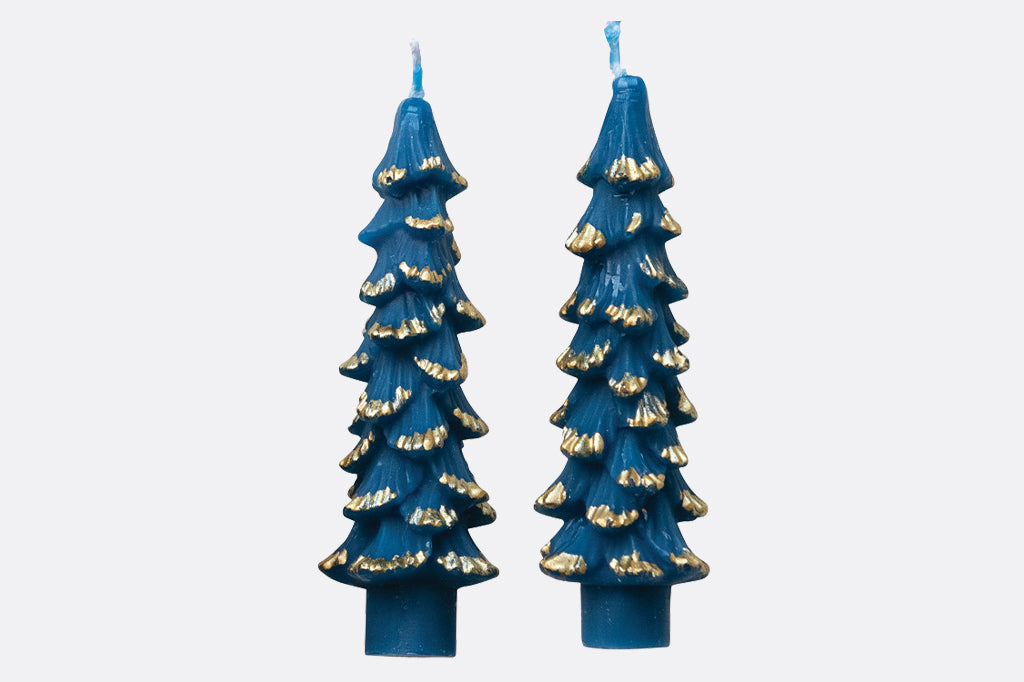 tree shaped taper candle in cerulean blue with gold tips. Comes in set of four 