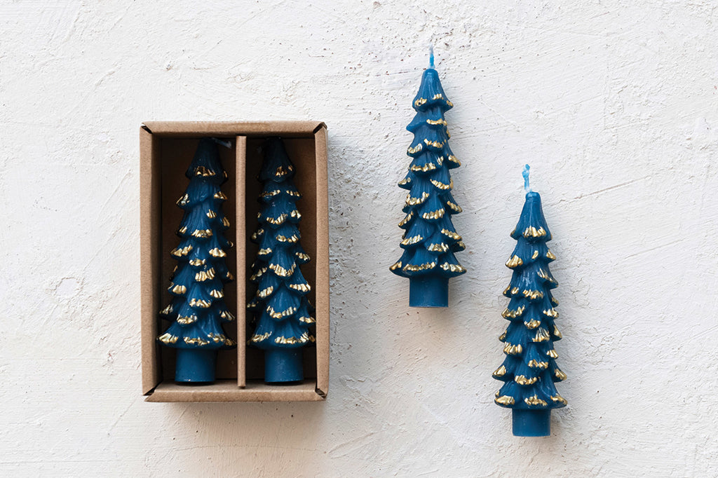 tree shaped taper candle in cerulean blue with gold tips. Comes in set of four 