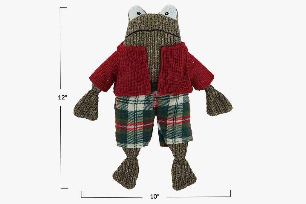 Knitted stuffed frog wearing red sweater and plaid pants shown with dimensions of 12"H 10"W