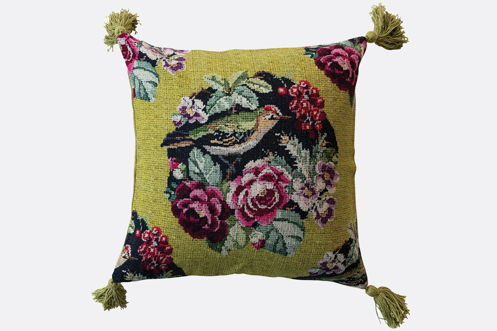 Floral and bird embroidered pillow with tassels 