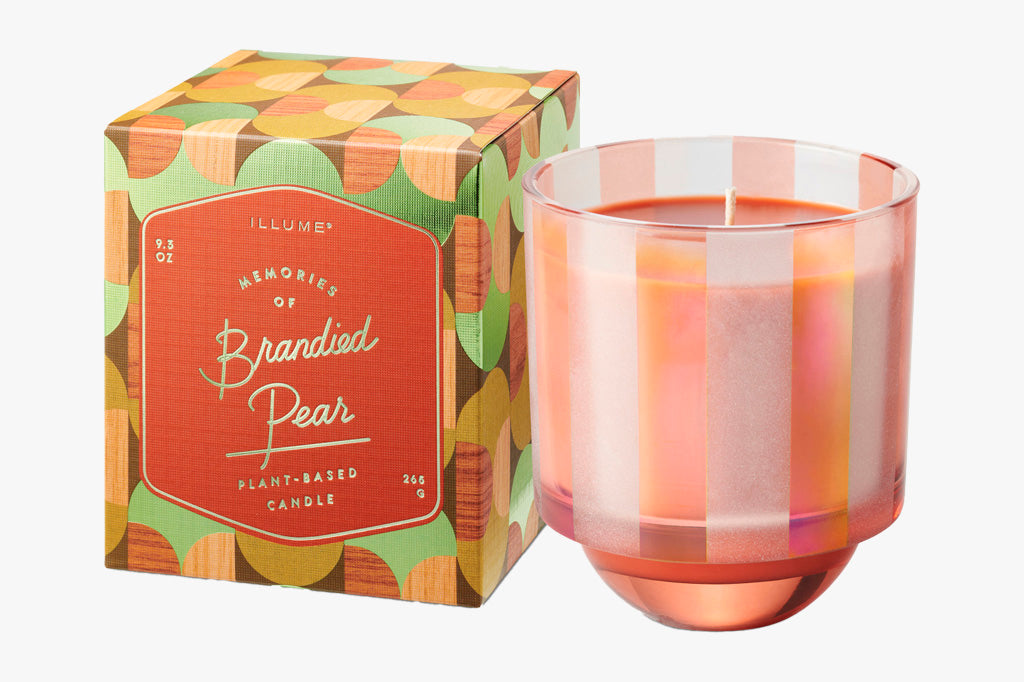 This pinky striped candle glass with dark peach wax shown with gift box