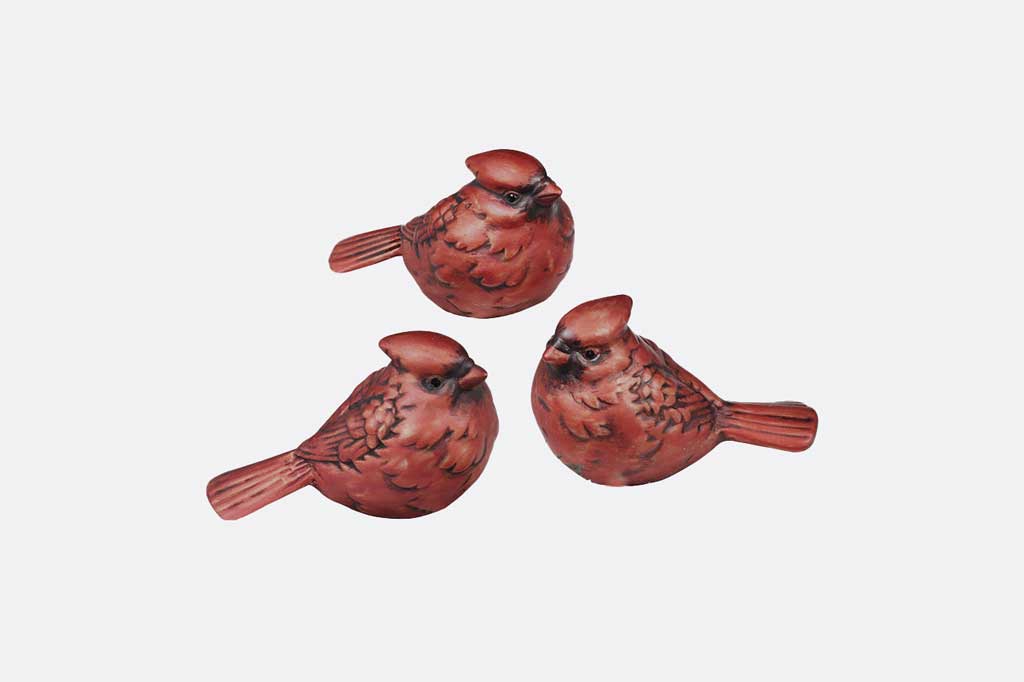 Set of three red cardinal bird figurines 