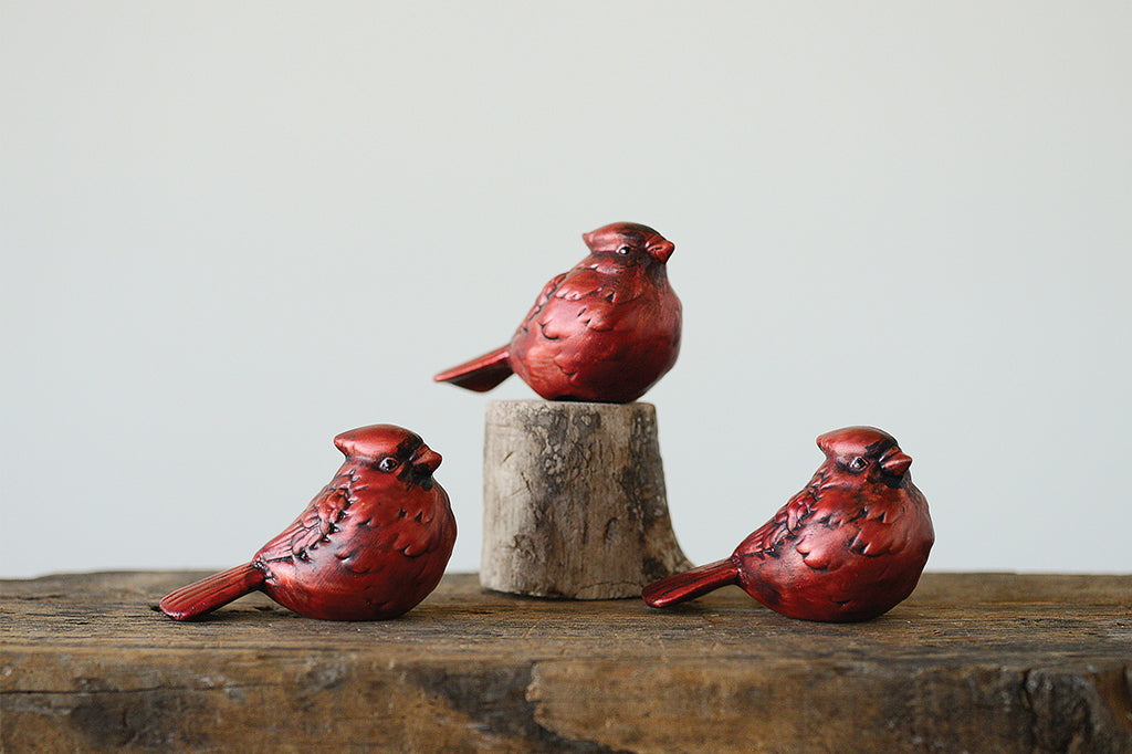 Set of three red cardinal bird figurines 