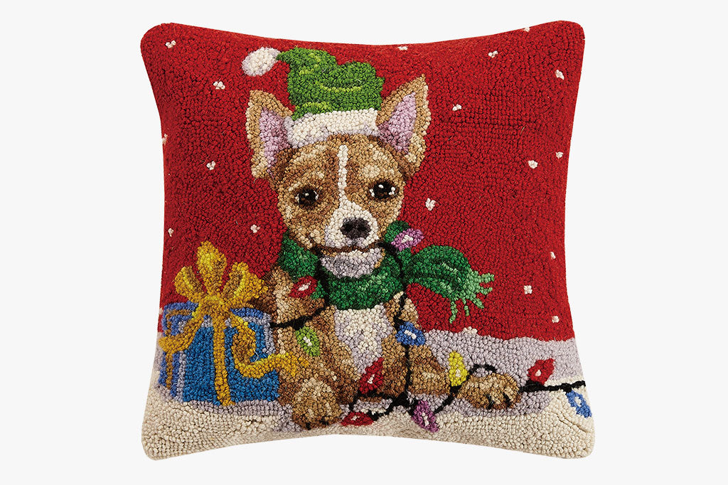 Hooked wool pillow with design of chihuahua, dressed in a green hat and scarf