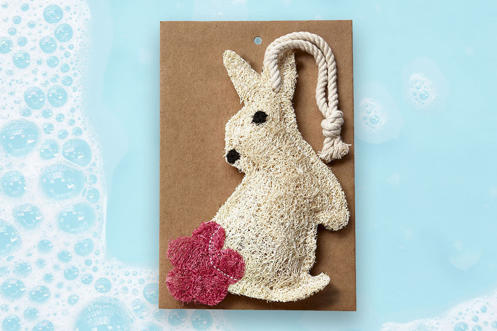 Compostable loofah dish scrubber, featuring bunny with a pink tail