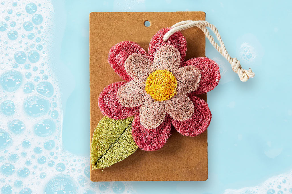 Compostable loofah dish scrubber, featuring pink blossom and green leaf