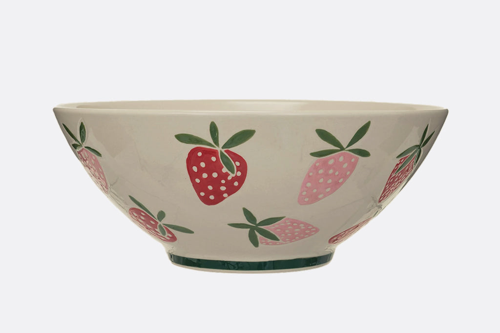 Strawberry stoneware serving bowl, featuring pink and red strawberries with green leaves. Green band on the footed bottom.  